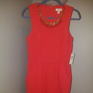 Coral cocktail dress with pockets